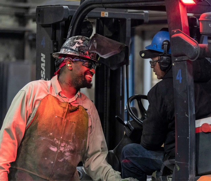 Who We Are-Smiling-Chatting-Forklift
